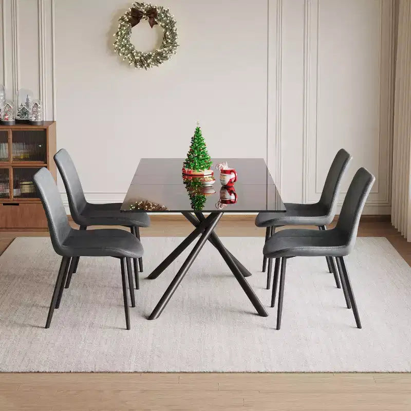 Ensemble de salle à manger contemporain GDFStudio Noemi 5 pièces avec table en verre extensible et chaises rembourrées en similicuir
